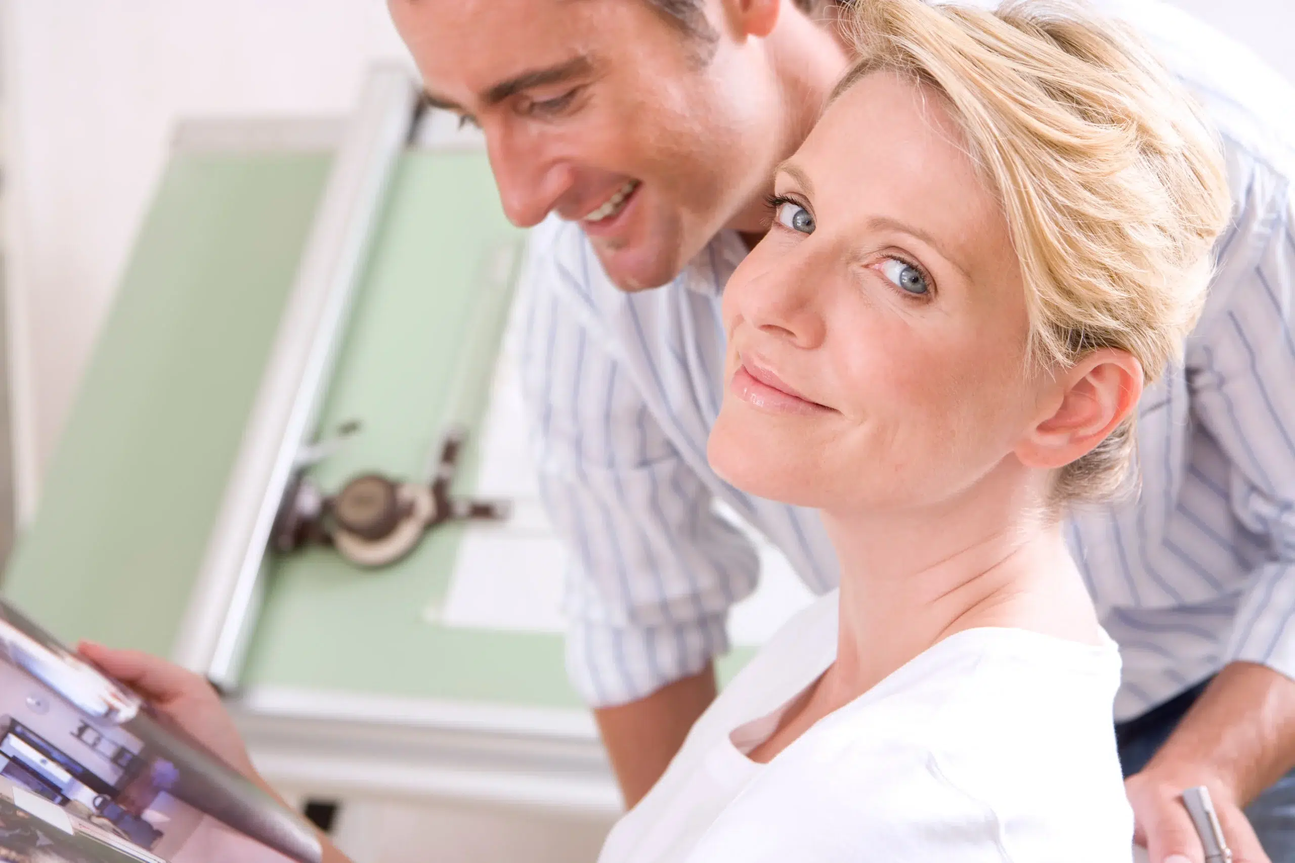 RCM specialist reviewing chiropractic billing services with practice manager