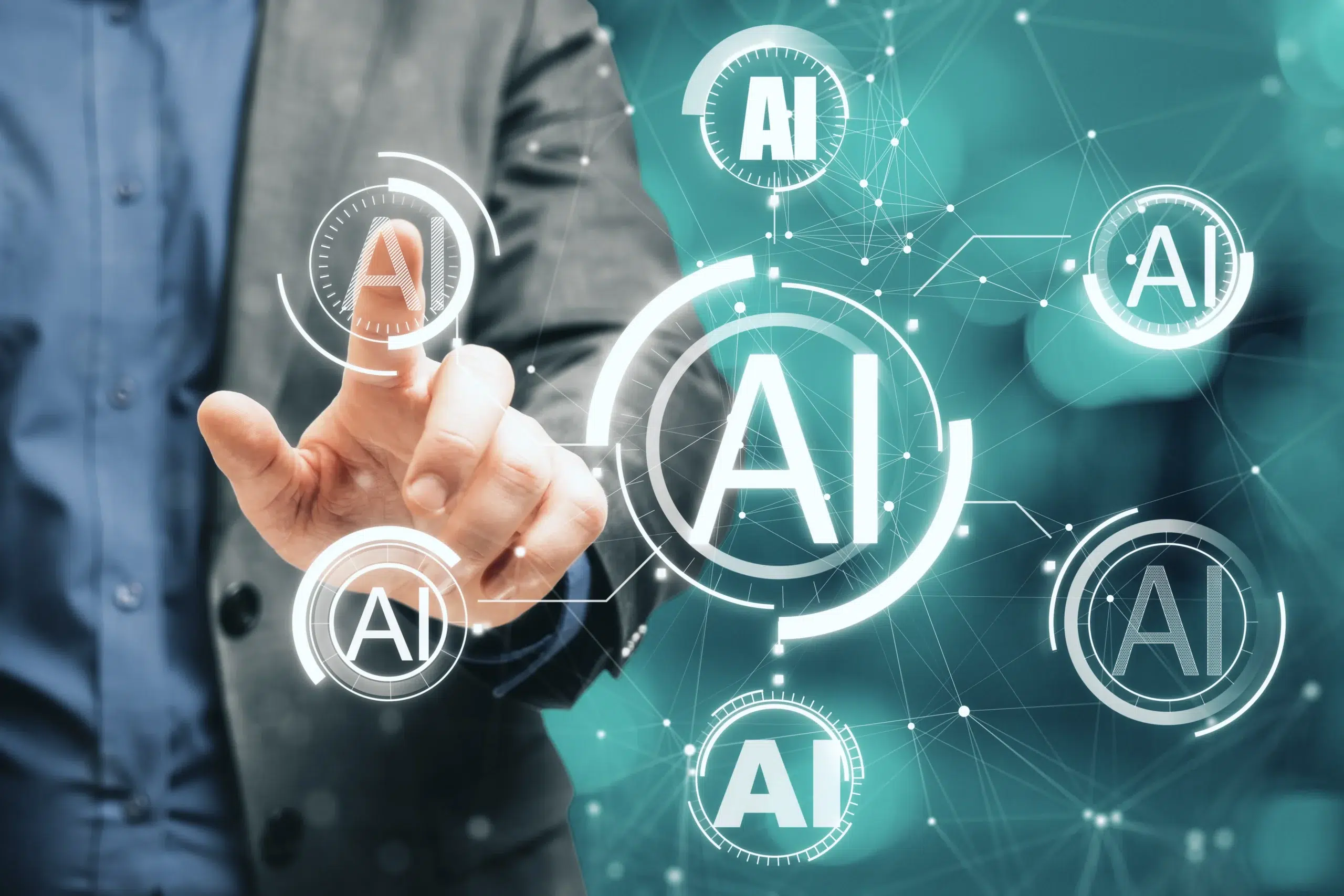 Close-up of a businessman's hand pointing at an interactive network of circular holograms with the 'AI' symbol, symbolizing control over artificial intelligence in revenue cycle management systems for automated workflow decisions.